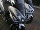 Daelim  S 3 in 125cc range with gray case and helmet 2011 Scooter photo