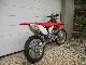 Honda  crf 250 x electric start and a car letter 2006 Rally/Cross photo