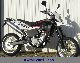 2011 Husqvarna  SMR 630 black and white and red in stock Motorcycle Super Moto photo 2