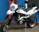 2011 Husqvarna  SMR 630 black and white and red in stock Motorcycle Super Moto photo 3
