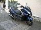 2011 Kymco  Downtown 125 Motorcycle Scooter photo 1