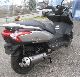 2009 Kymco  Downtown 125i from 1 Hand Motorcycle Scooter photo 1