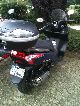 2010 Kymco  Downtown Motorcycle Scooter photo 1